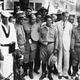 Sergeant Fulgencio Batista, center, hand on belt, who overnight has become the center of activity in the latest Cuban trouble, is shown Sept. 7, 1933. From his place as top sergeant in the Cuban Army he took the title of "Revolutionary Chief of Armed Forces" in the uprising which caused the downfall of the de Cespedes government.